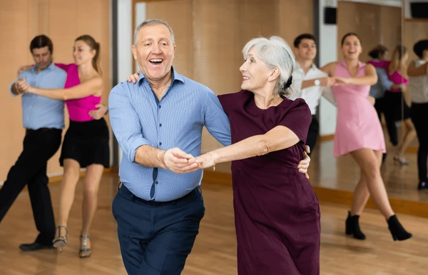 happy-older-couple-performing-paired-600nw-2264620757